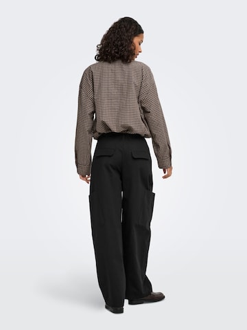 Jaqueline de Yong Tussenjas 'Umi' in Bruin