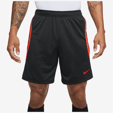 NIKE Loose fit Workout Pants 'Dri-Fit Strike' in Black: front