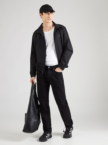 Calvin Klein Välikausitakki värissä musta