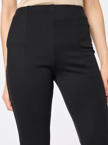 Warehouse Flared Leggings in Black