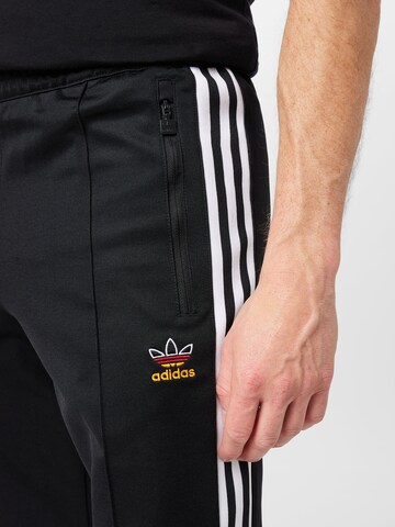 regular Pantaloni 'Beckenbauer' di ADIDAS ORIGINALS in nero