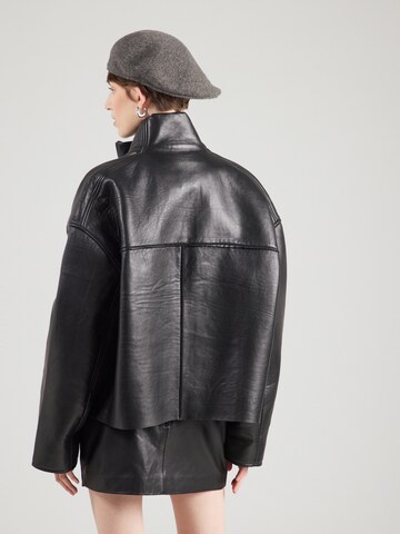 Giacca di mezza stagione di REMAIN in nero