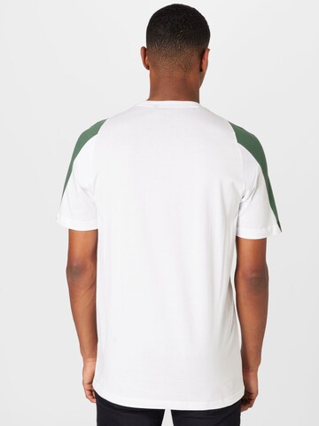 ADIDAS SPORTSWEAR - Camisa funcionais 'Future Icons Embroidered Badge Of Sport' em branco