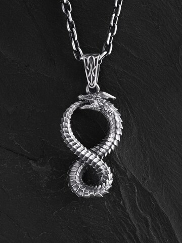 Brelocuri 'OUROBOROS' de la REYTEL pe argintiu