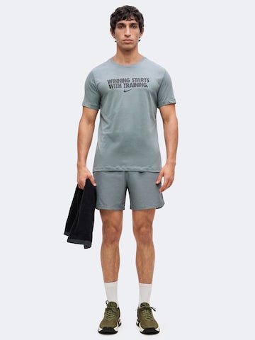 NIKE Funkcionális felső 'WINNING' - szürke