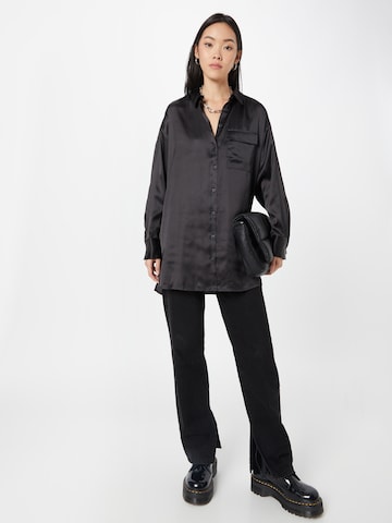 QS - Blusa en negro