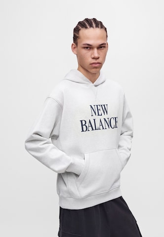 Sweat-shirt new balance en gris : devant