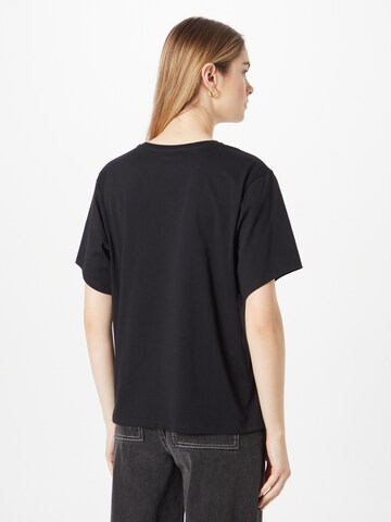 Iriedaily T-shirt 'Daisycycle' i svart