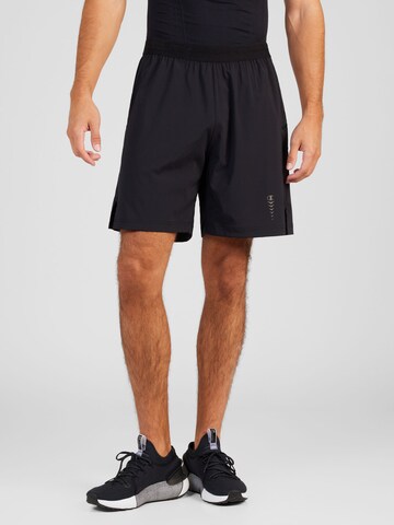Champion Authentic Athletic Apparel Normalny krój Spodnie sportowe w kolorze czarny: przód