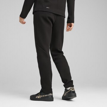 PUMA Slim fit Sports trousers in Black
