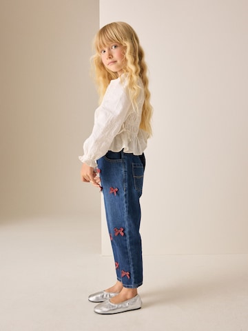 Next - Ropa ancha Vaquero en rojo