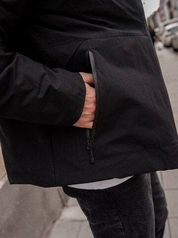 DAN FOX APPAREL Зимняя куртка 'Paul' в Черный