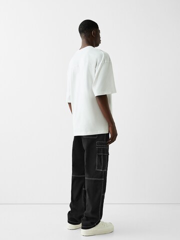 Bershka Loose fit Cargo Pants in Black