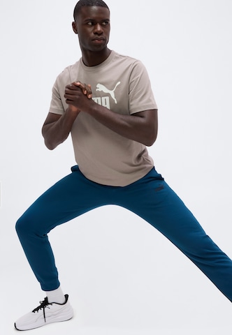 PUMA Regular Sports trousers 'ESS No. 1' in Green