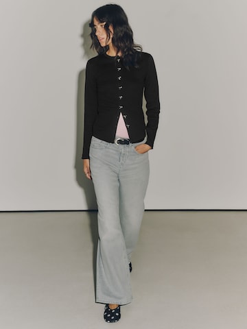 Next Neuletakki värissä musta