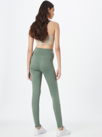 Hummel Skinny Športne hlače 'Tola' | zelena barva