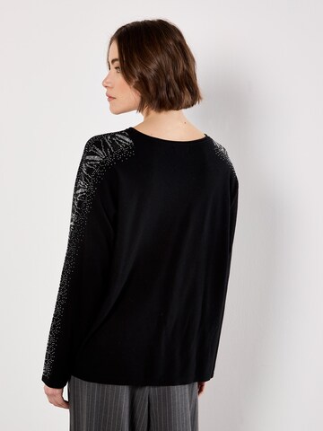 Pull-over ' ' Apricot en noir