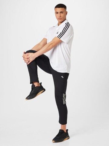 Effilé Pantalon de sport 'Own The Run Astro' ADIDAS PERFORMANCE en noir