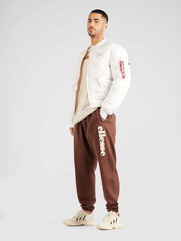 ELLESSE Tapered Pants 'Garsi' in Brown