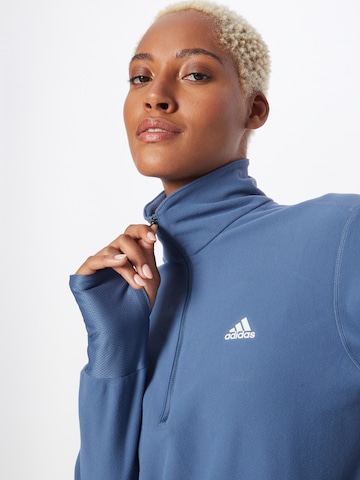 Felpa sportiva 'Own The Run ' di ADIDAS SPORTSWEAR in blu