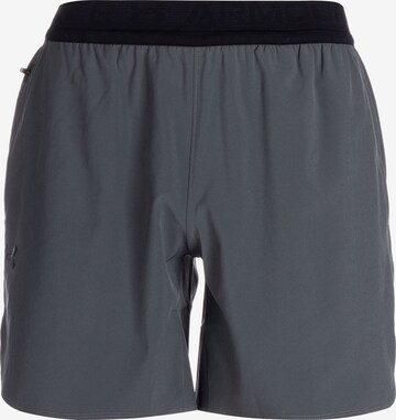 Regular Pantalon de sport 'Peak Woven' UNDER ARMOUR en gris : devant