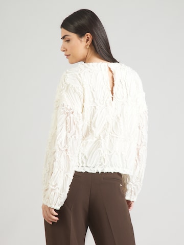 co'couture - Blusa en blanco