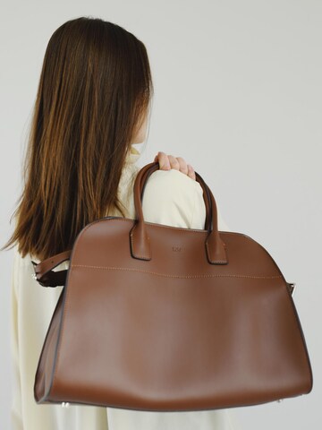 L37 HANDMADE SHOES - Bolso de mano 'BON VOYAGE' en marrón: frente
