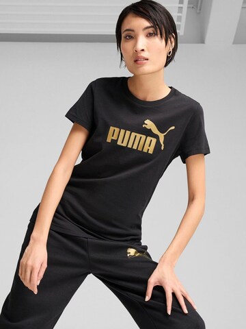 PUMA Shirt 'Puma Ess Metallic No. 1 Logo Tee'‌‌‌‌‌ in Schwarz