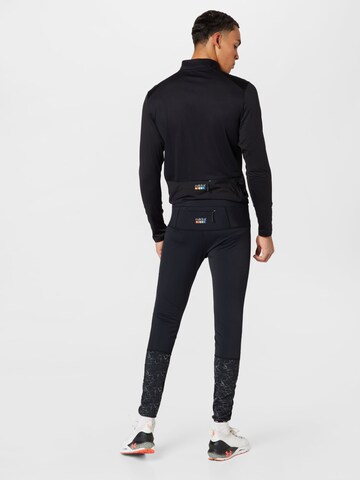 Rukka Skinny Spodnie sportowe 'MUSTIS' w kolorze czarny