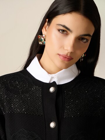 Cardigan oltre en noir
