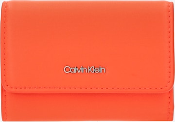 Portofel 'Trifold XS' de la Calvin Klein pe portocaliu: față
