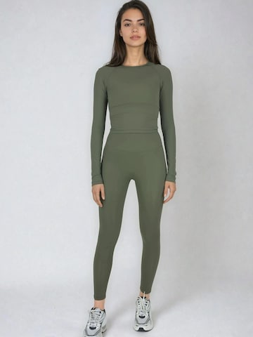Flavia Valentini - Skinny Leggings en verde: frente