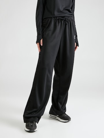 Nike Sportswear - Loosefit Pantalón 'AIR BREAKAWAY' en negro: frente