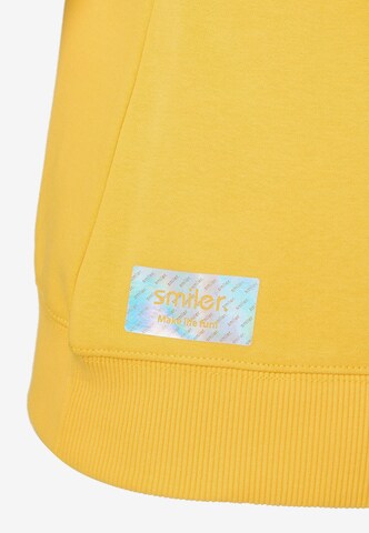 Sweat-shirt 'Cuddle' smiler. en jaune