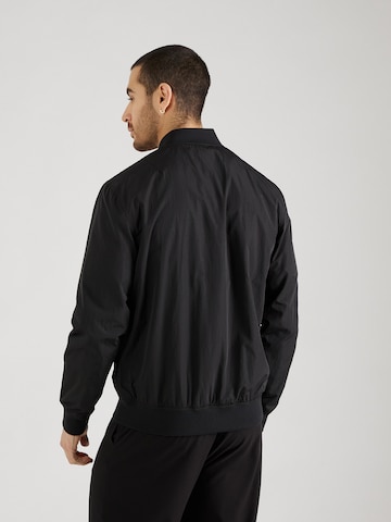 ABOUT YOU x Kevin Trapp Between-Season Jacket 'Robin' in Black