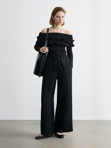 Top ' Flouncecras ' di Crās in nero: frontale