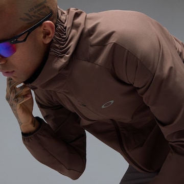 OAKLEY Μπουφάν άσκησης 'EDGE FORCE' σε καφέ