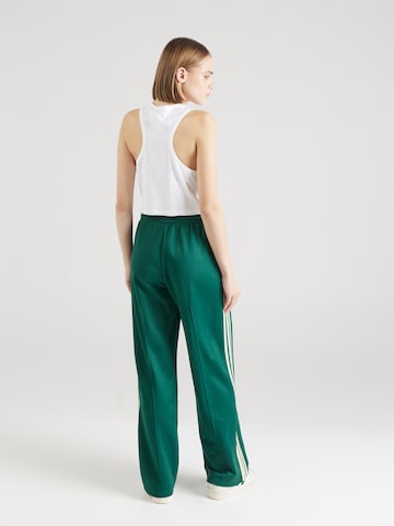 ADIDAS ORIGINALS Szeroka nogawka Spodnie w kolorze zielony