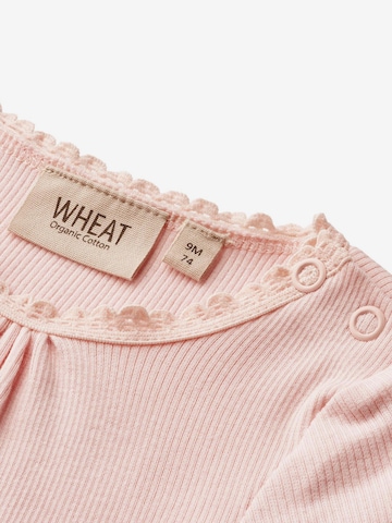 Tutina / body per bambino di Wheat in rosa