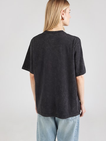 Nike Sportswear T-Shirt 'CLASSICS+' in Schwarz
