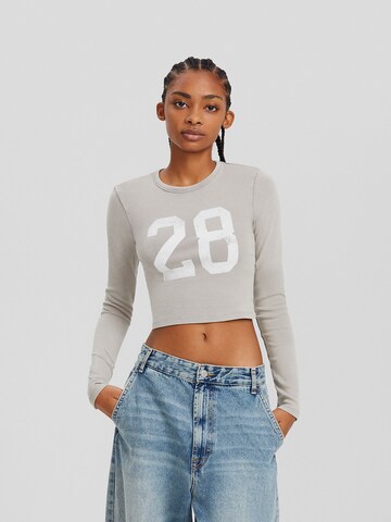 T-shirt Bershka en gris : devant