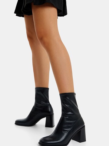 Bershka Bootie in Black: front