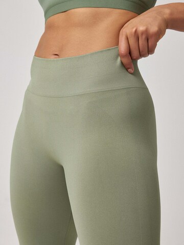 SNOCKS Skinny Sportbroek 'Seamless' in Groen