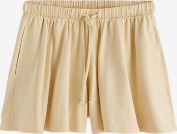 Next Byxa i gul: framsida