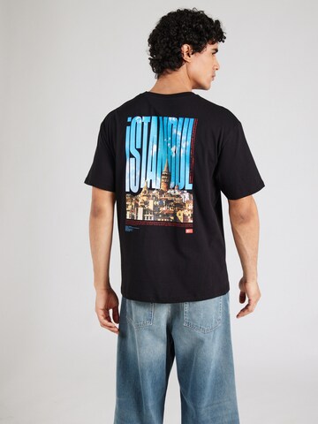 Tricou 'JORISTANBUL' de la JACK & JONES pe negru: față