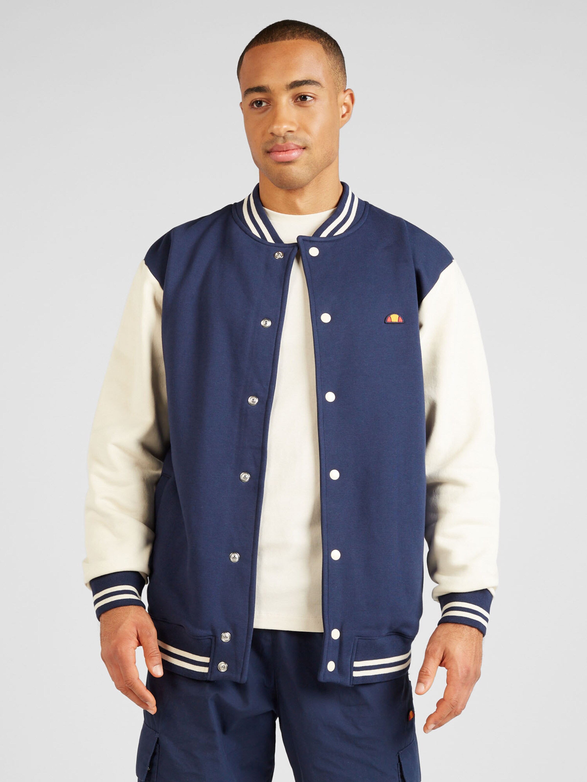 ELLESSE Between Season Jacket Downtown in Navy ABOUT YOU