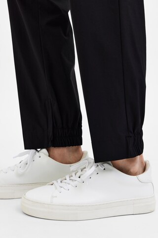SELECTED HOMME Slim fit Trousers with creases 'Cyle' in Black