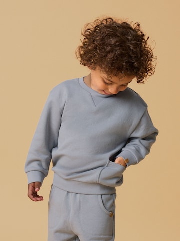Lil'Atelier - Sudadera en gris: frente