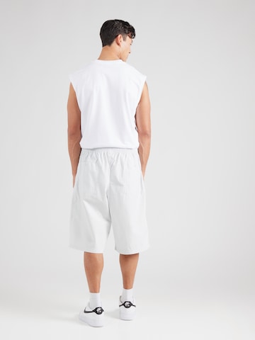 Nike Sportswear Loosefit Bandplooibroek 'CLUB SEOUL' in Grijs