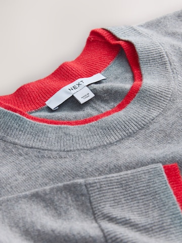 Next Pullover in Grau